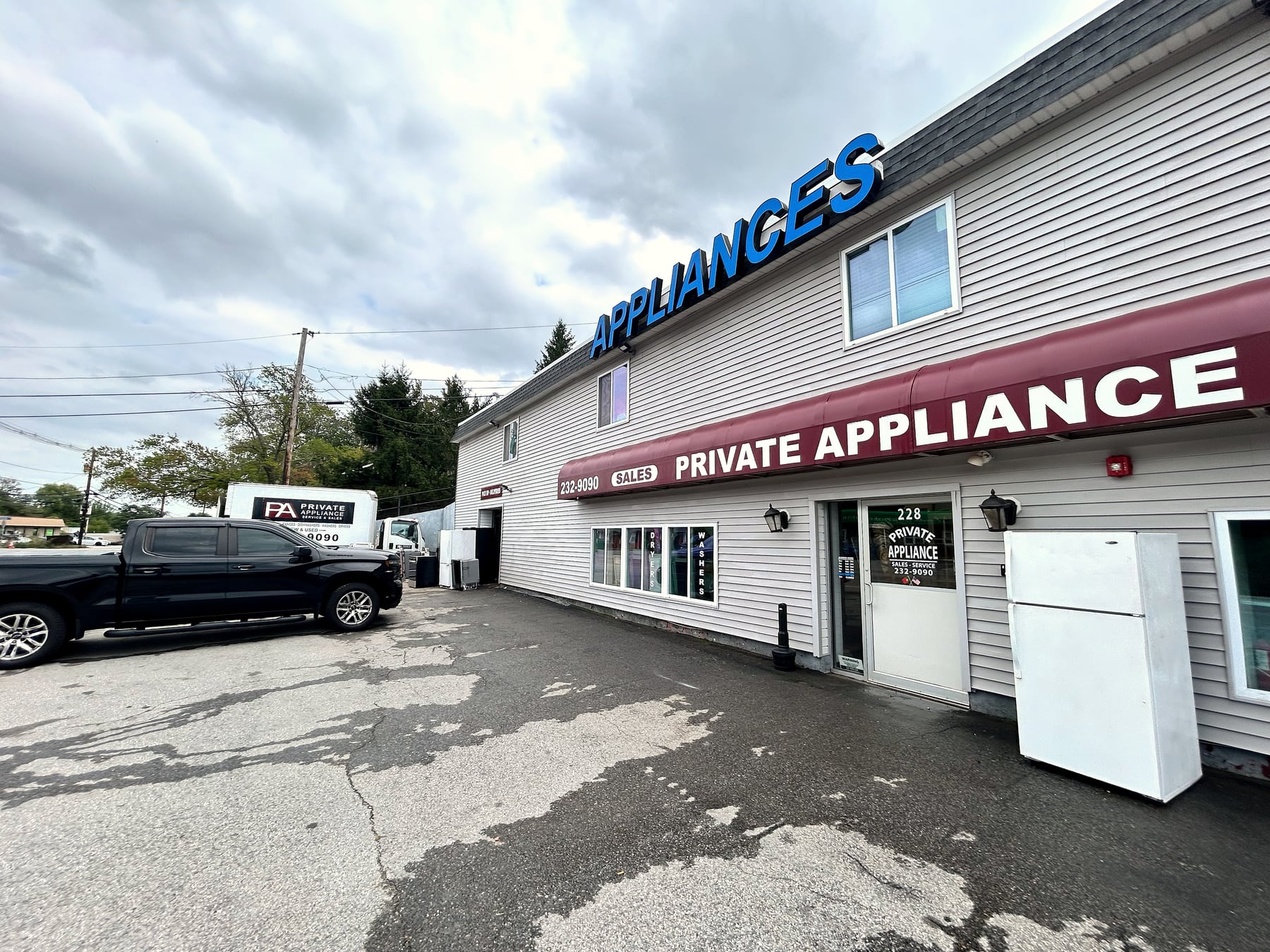 Private Appliance at 228 Putnam Pike, with the shop truck in the lot